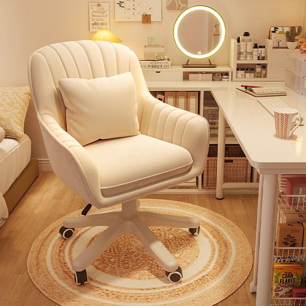 Cream Oakcraft cute office chair with a scalloped back and cushion on castors