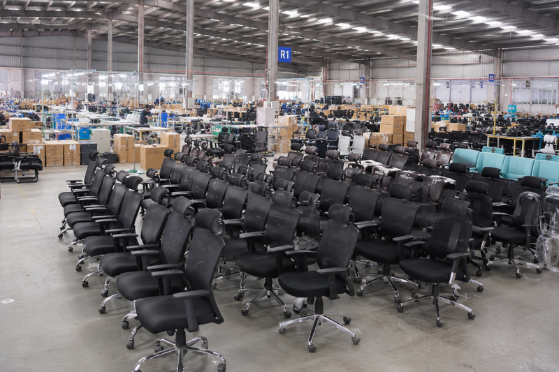 Mesh chair assembly at the Oakcraft factory in Delhi