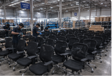 Quality checking chairs at the Oakcraft factory in Delhi