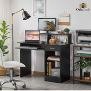 Black Oakcraft computer desk with monitor and shelves styled with a white office chair
